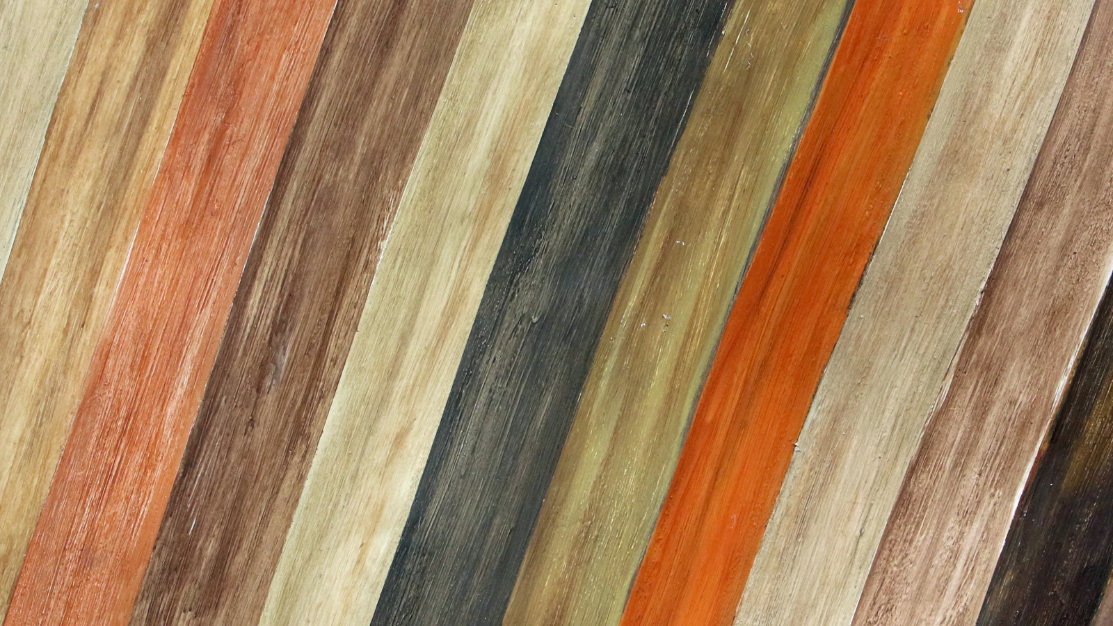 Wood plank samples finished in a range of colors from natural to dark