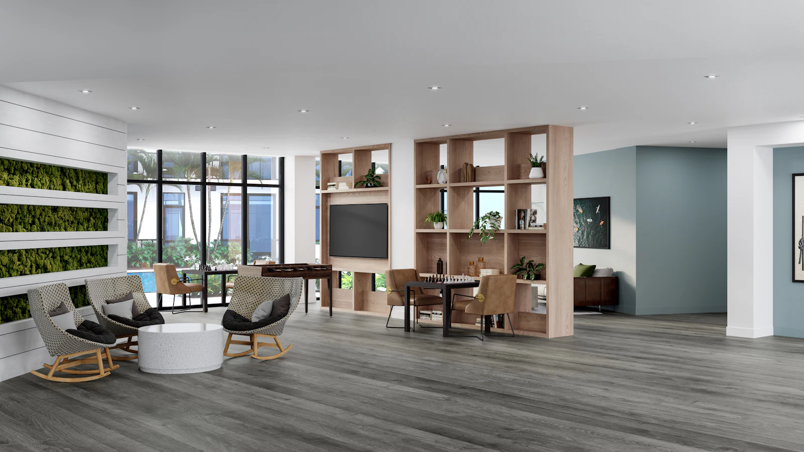Wide-plank gray luxury vinyl plank flooring running through an open modern living space