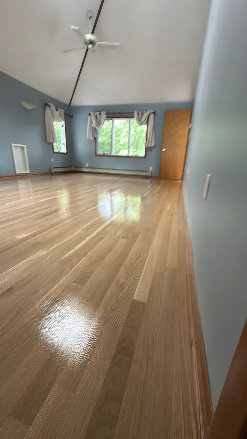 Hardwood Staircase Landing with Wainscot