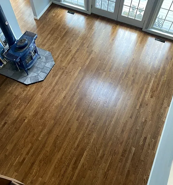 Hardwood Floor Beside a Wood-Burning Stove