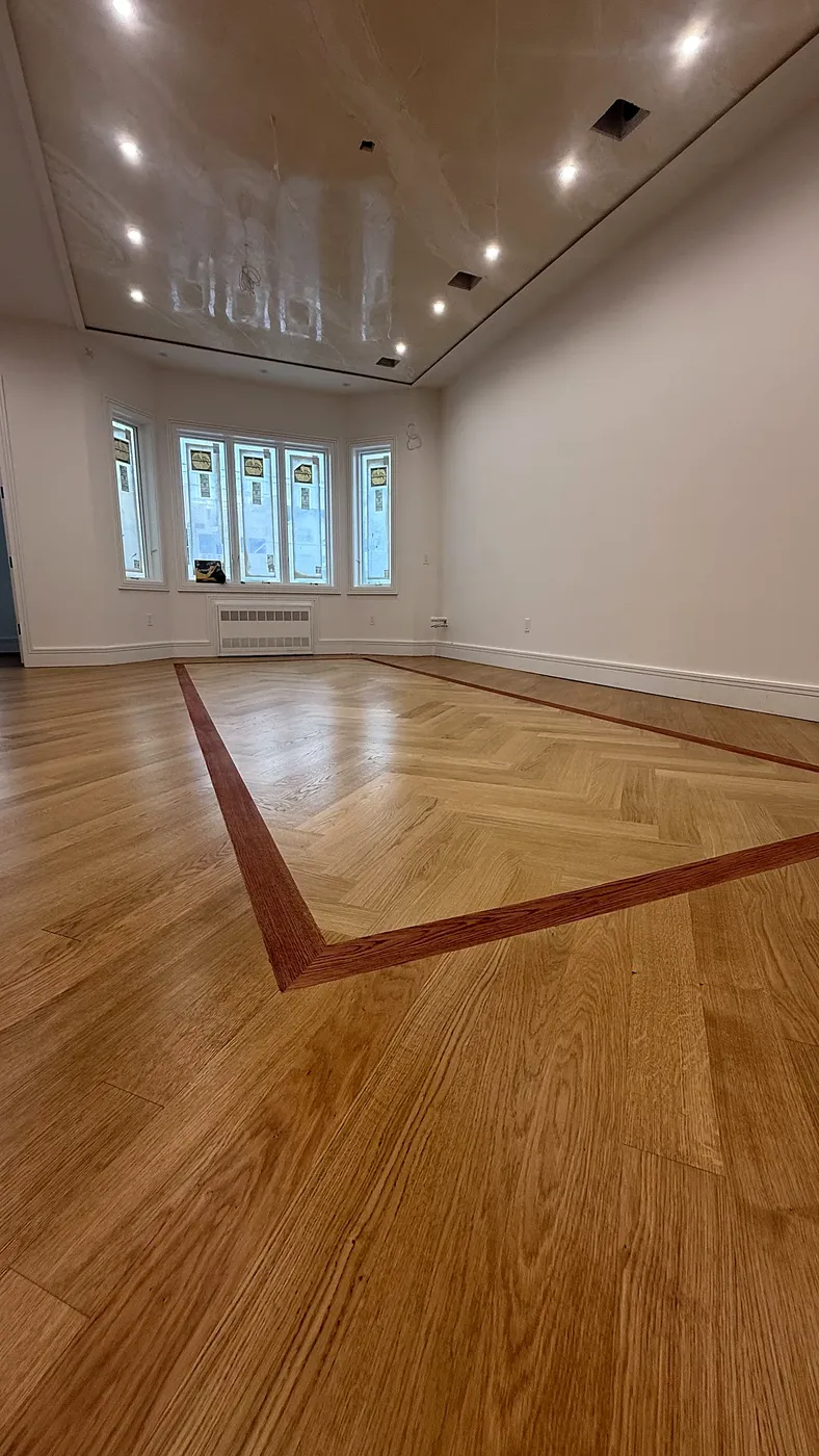 Walnut-Bordered Herringbone Floor Detail