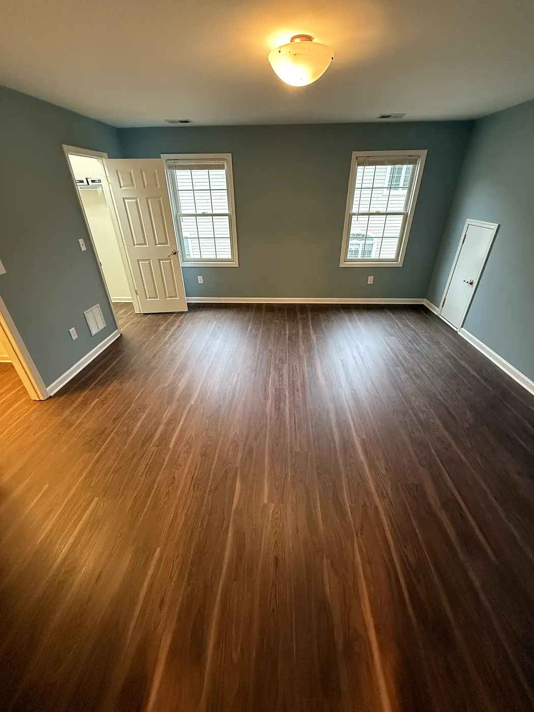 Dark LVP in a Primary Bedroom