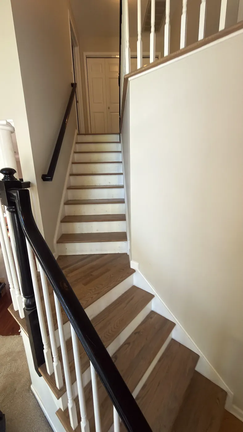Staircase with Black Handrail
