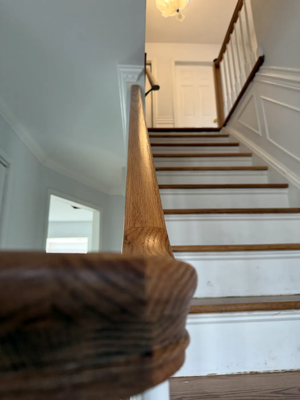 Staircase Overlook with Wainscot Paneling