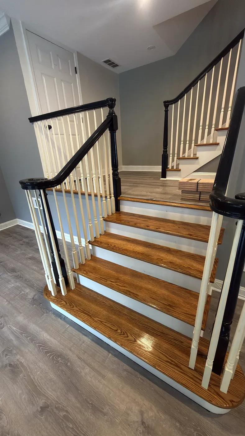 Staircase with Turned Balusters Over Two Flights